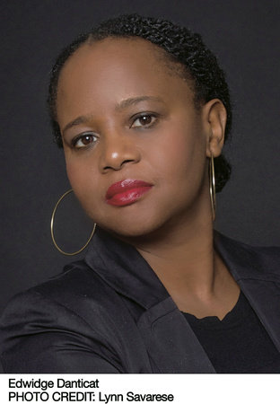 Edwidge Danticat wearing a black blazer and looking at the camera.