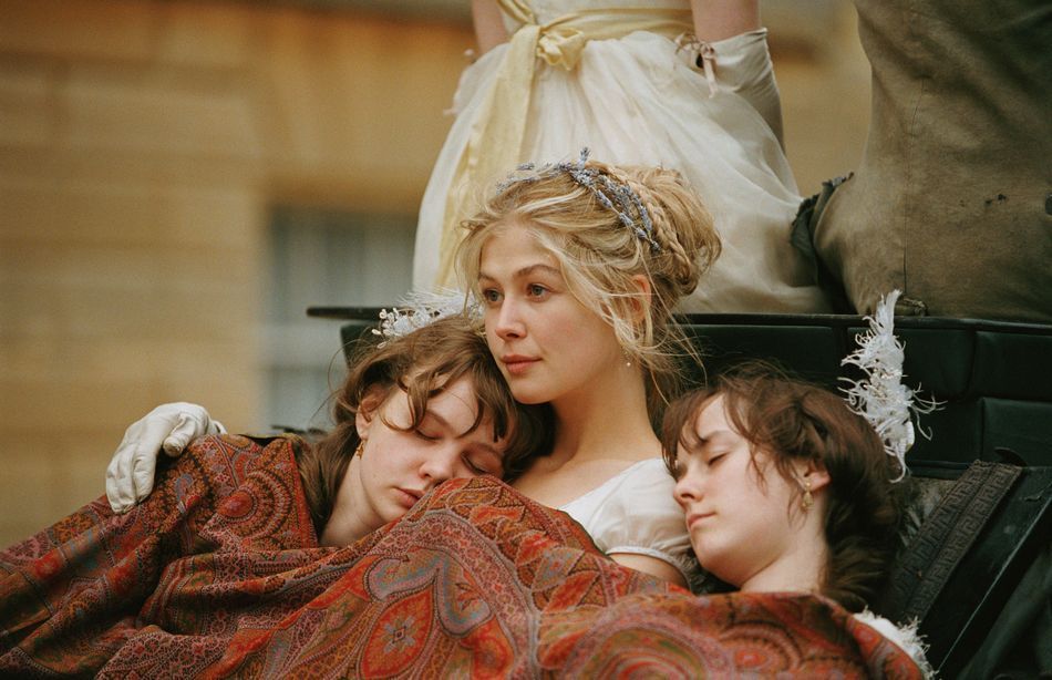 Jane bennet in a carriage with her two youngest sisters asleep on her shoulders and covered with a blanket