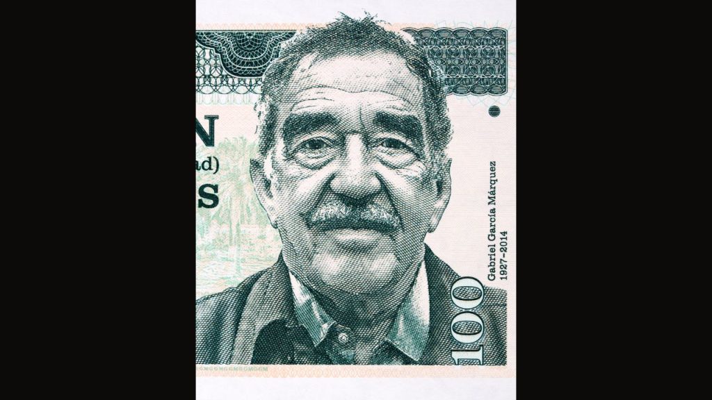 Portrait of Gabriel García Márquez on a 100 dollar bill. His birth and death year are inscribed under his name above his right shoulder.