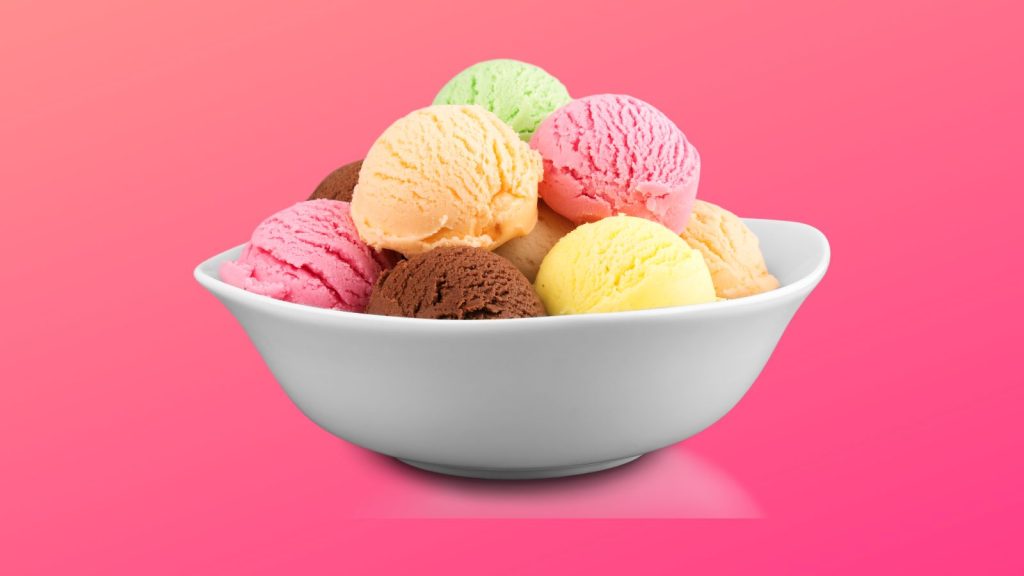 Bowl of different types of ice cream on a orange-ish pink background.