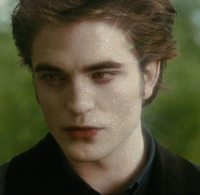 robert pattinson as edward cullen with sparkling skin and amber eyes