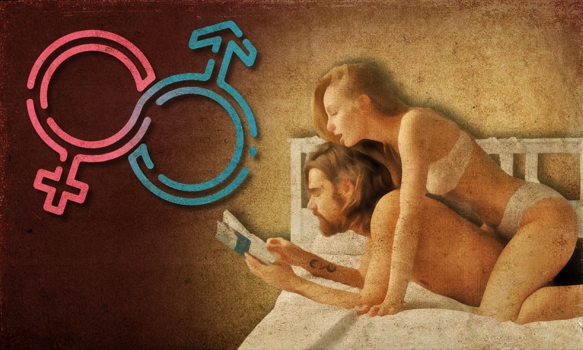 A couple in bed reading a book.