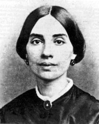 Black and white portrait photo of Emily Dickinson