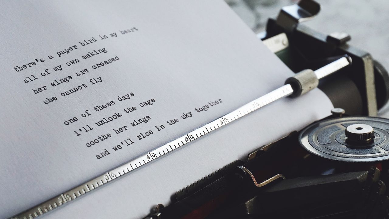 A short poem sitting in what looks like a typewriter.