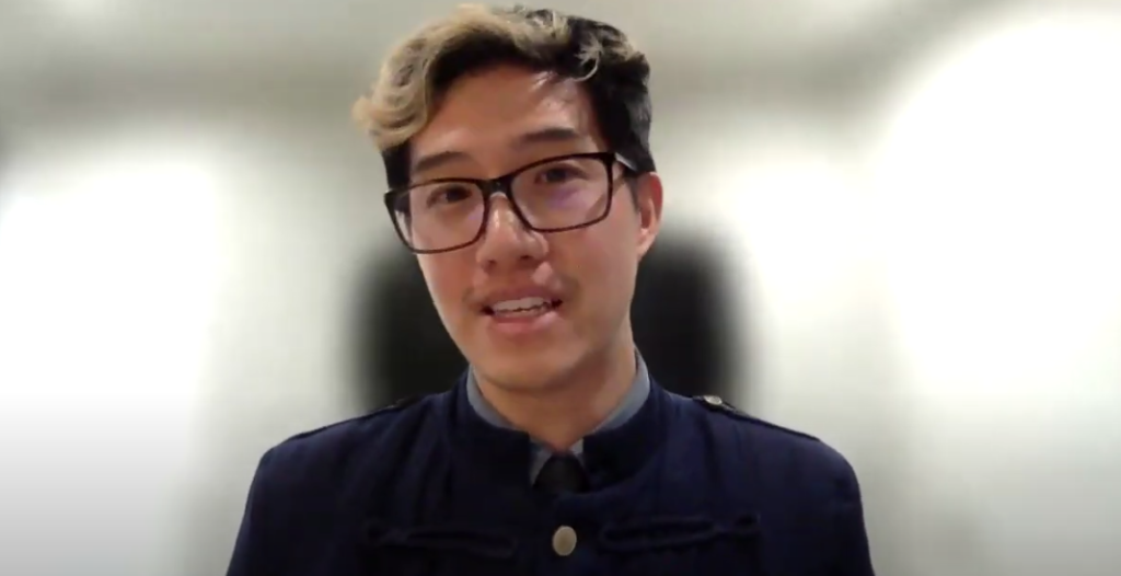 Raymond Pun looking at the camera.