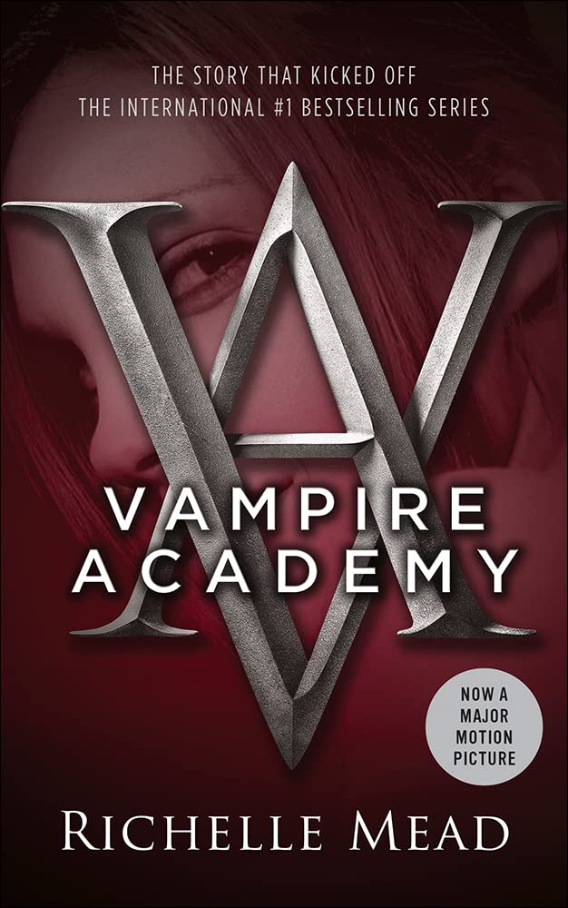Vampire Academy by Richelle Mead. A cover of the VA symbol, a woman faded in the back.