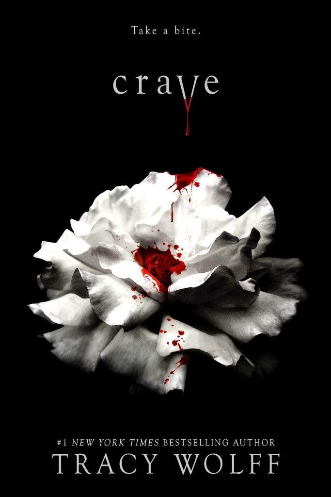 Crave by Tracy Wolff. A white rose, blood dripping on the petals.