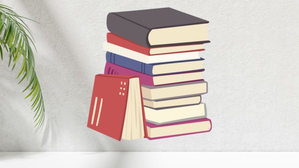 Stack of cartoon books on a white wall background with a big leaf in the corner.