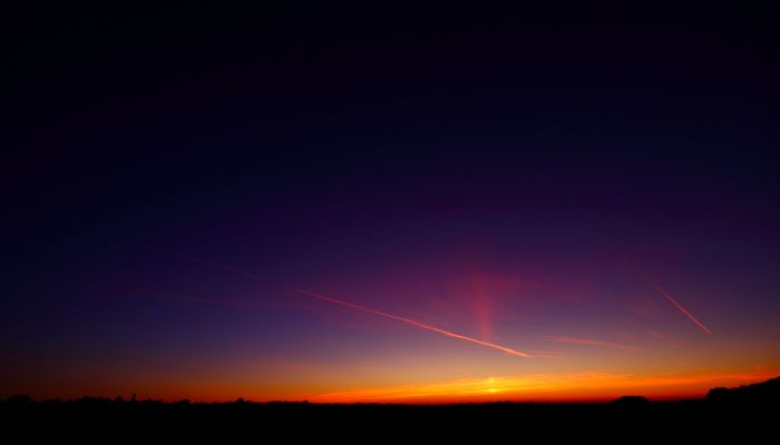 A blue and orange sky.