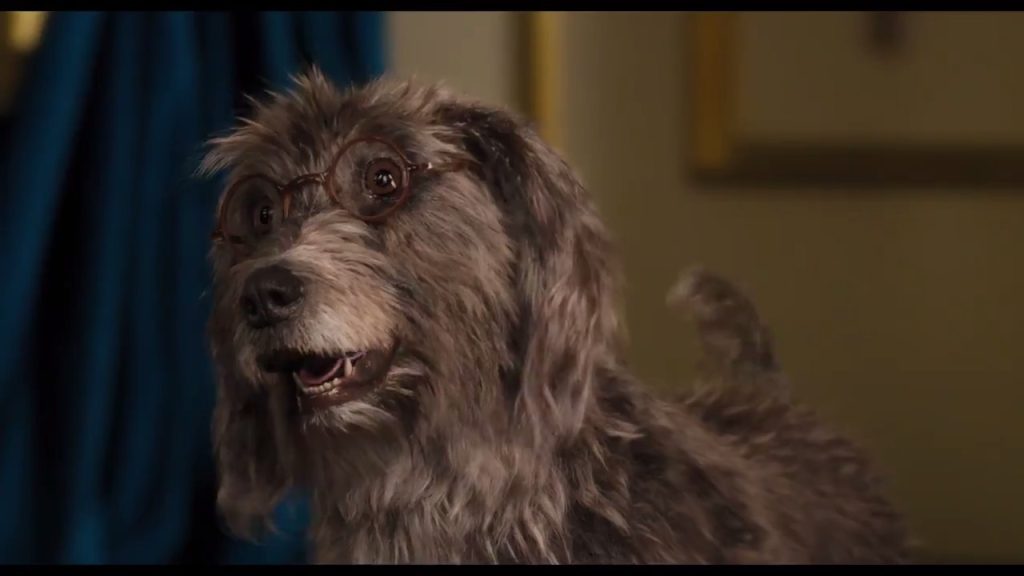 Jip, Dr. Dolittle's trusted canine companion in the recent live adaptation, dons glasses and appears to engage in conversation, showcasing his intelligence and loyalty.