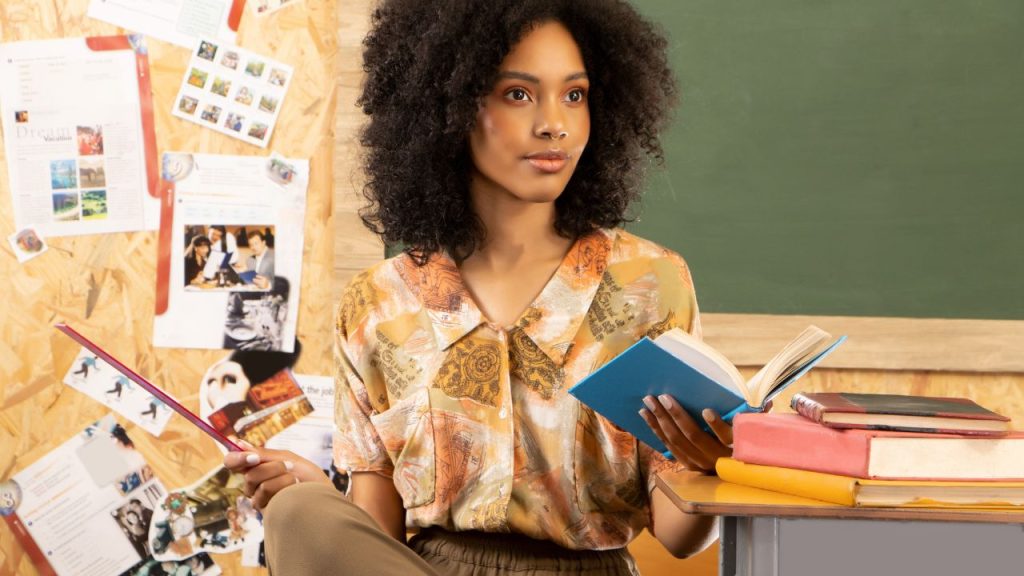 Teacher holding a book