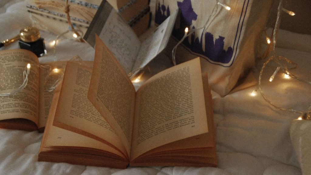 Open book with fariy lights all around