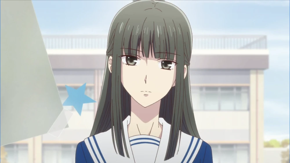 Kuragi staring blankly with her head tilted.