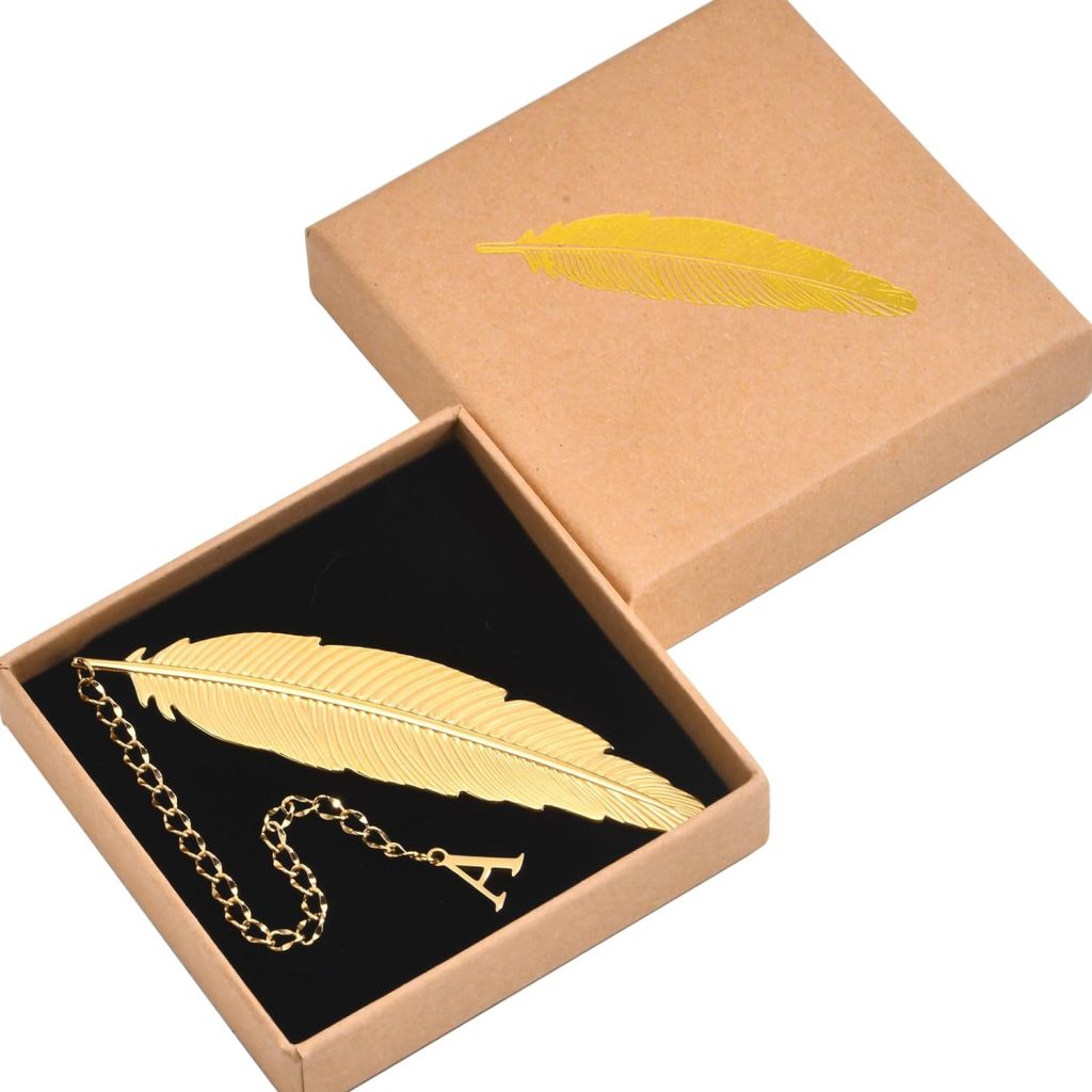Gold feather book mark with the initial A in a brown gift box.