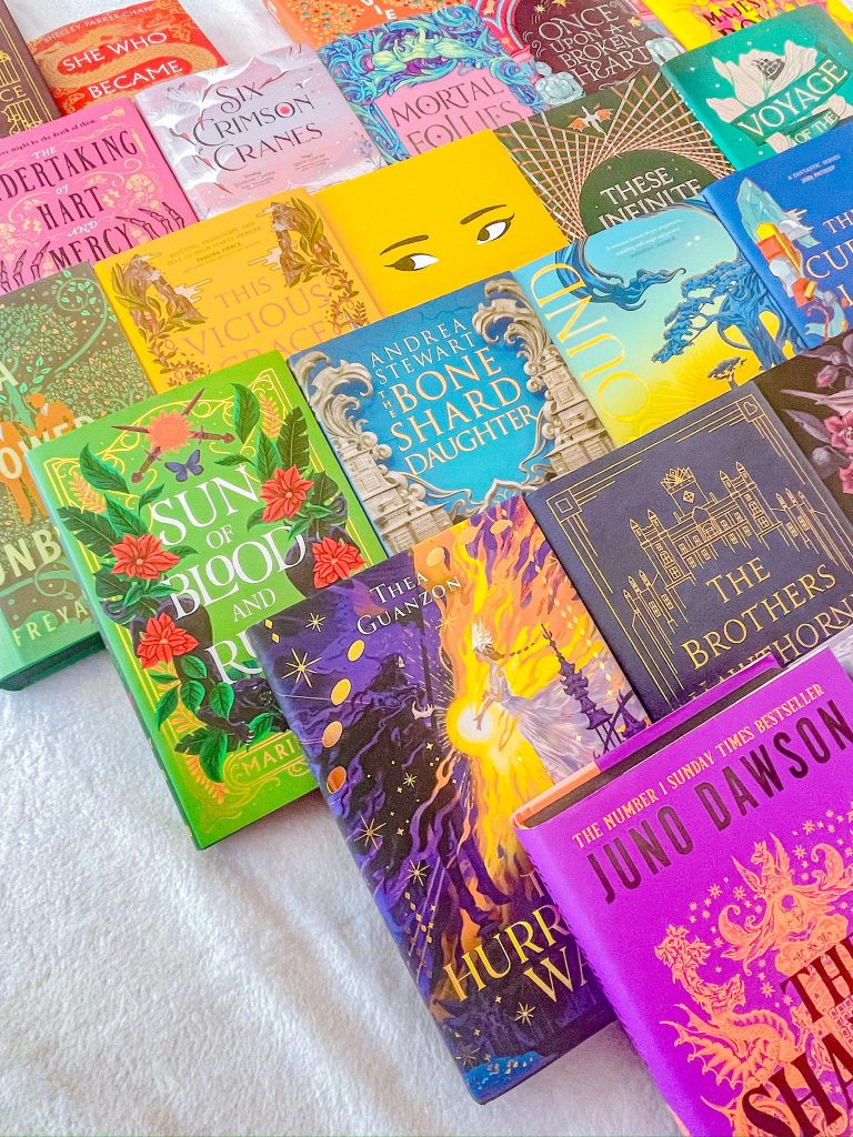Group of stacked books Frank owns.