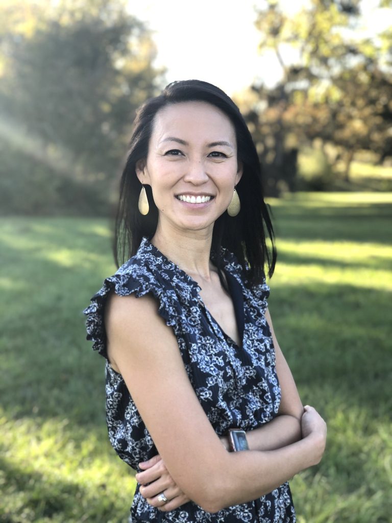 Dr. Jenny T. Wang outside in the sunshine.