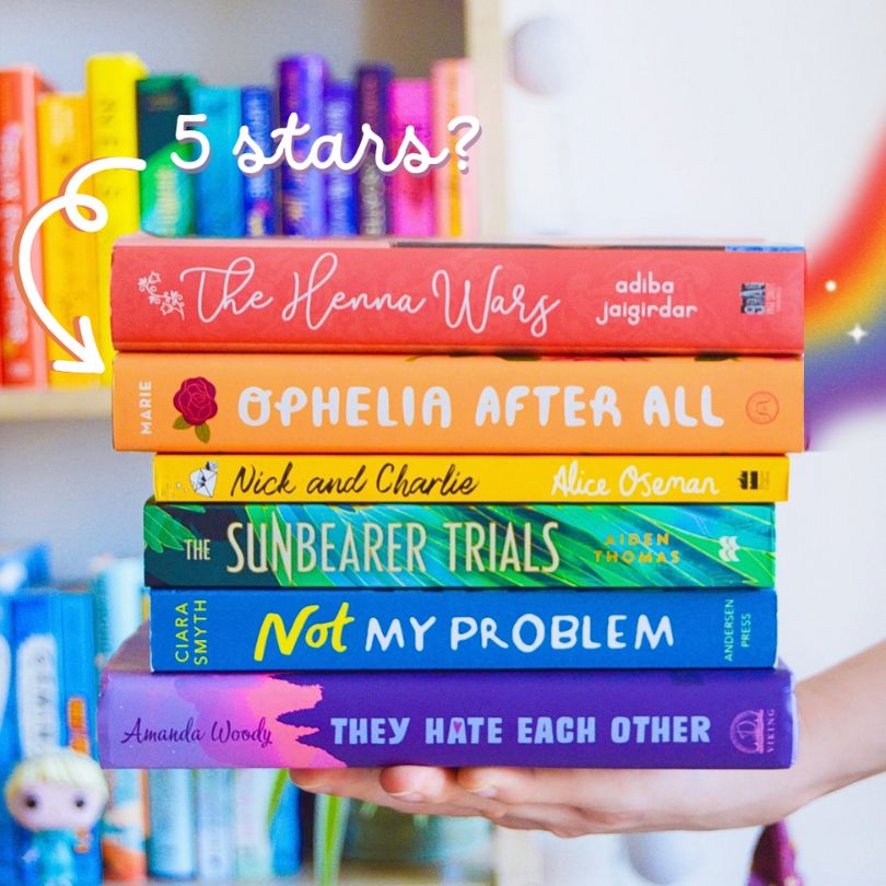 Photo of Eloise holding a rainbow book stack with the text "5 stars?"