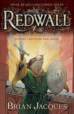 'Redwall' by Brian Jacques and illustrated by Gary Chalk book cover with a mouse holding a sword and shield.