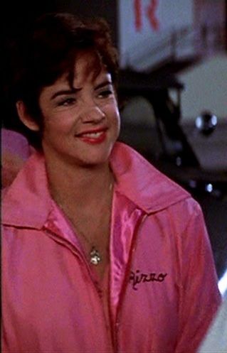Betty Rizzo smiling at something off camera