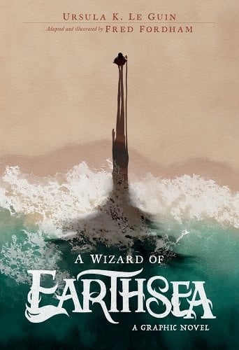 The cover for "A Wizard of Earthsea: The Graphic Novel," which is half water and half pale sand, with a cloaked figure walking before an exaggerated shadow.
