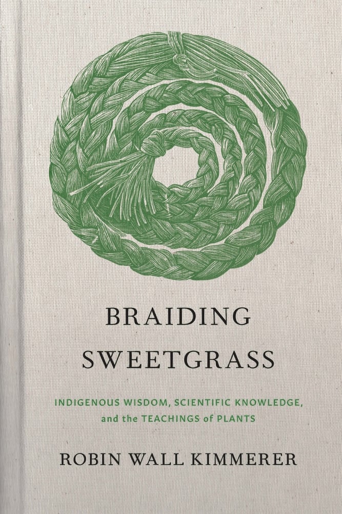 Braiding Sweetgrass cover, coiled grass rope in the center.