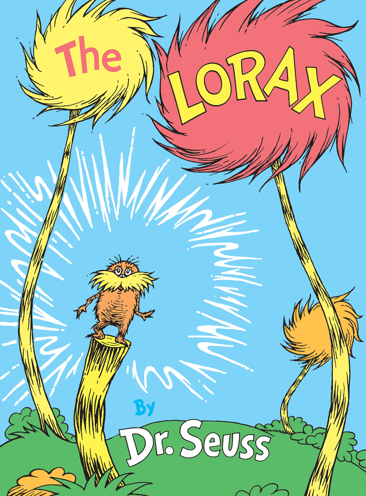 A little orange guy (The Lorax) standing on a tree stump.