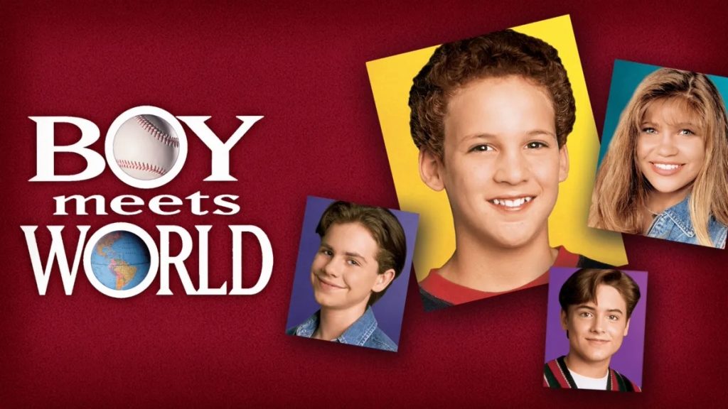Boy Meets World cover with a red background. the "O" in boy is a baseball and the "o" in world is a globe. From left to right, Shawn, Cory, Erik, and Topanga.