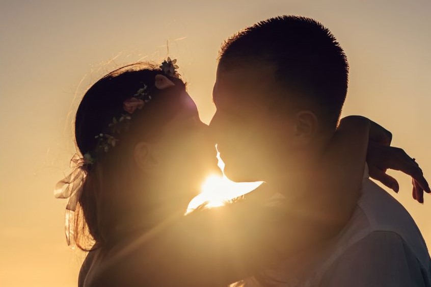 Two people kissing