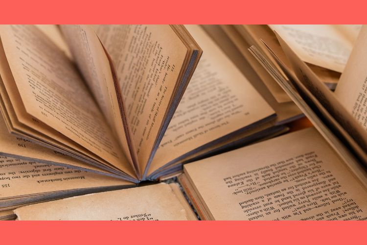 Several books opened with pages turned brown.