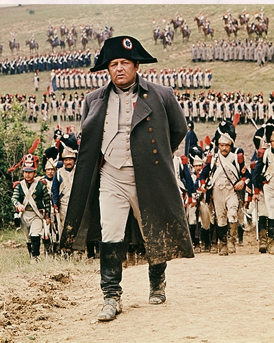 Napoleon Bonaparte walking ahead of his soldiers.
