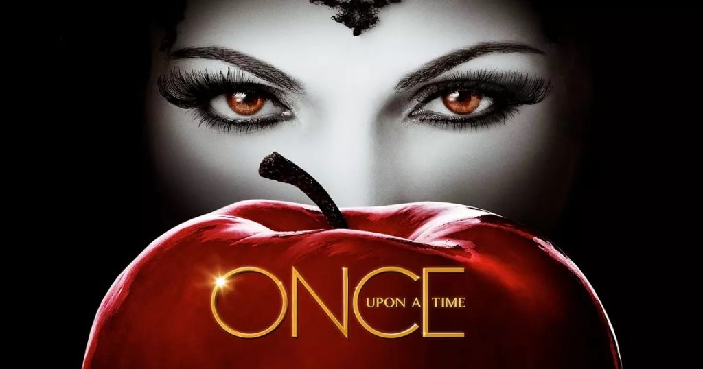 Once Upon a Time cover with the evil queen looking into the camera with a red apple in front of her.