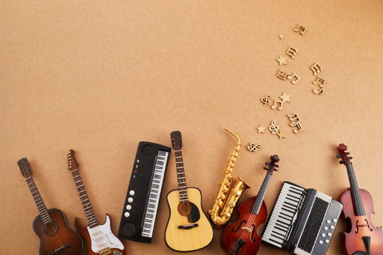 Various musical instruments (guitar, violin, keyboard) on the floor.