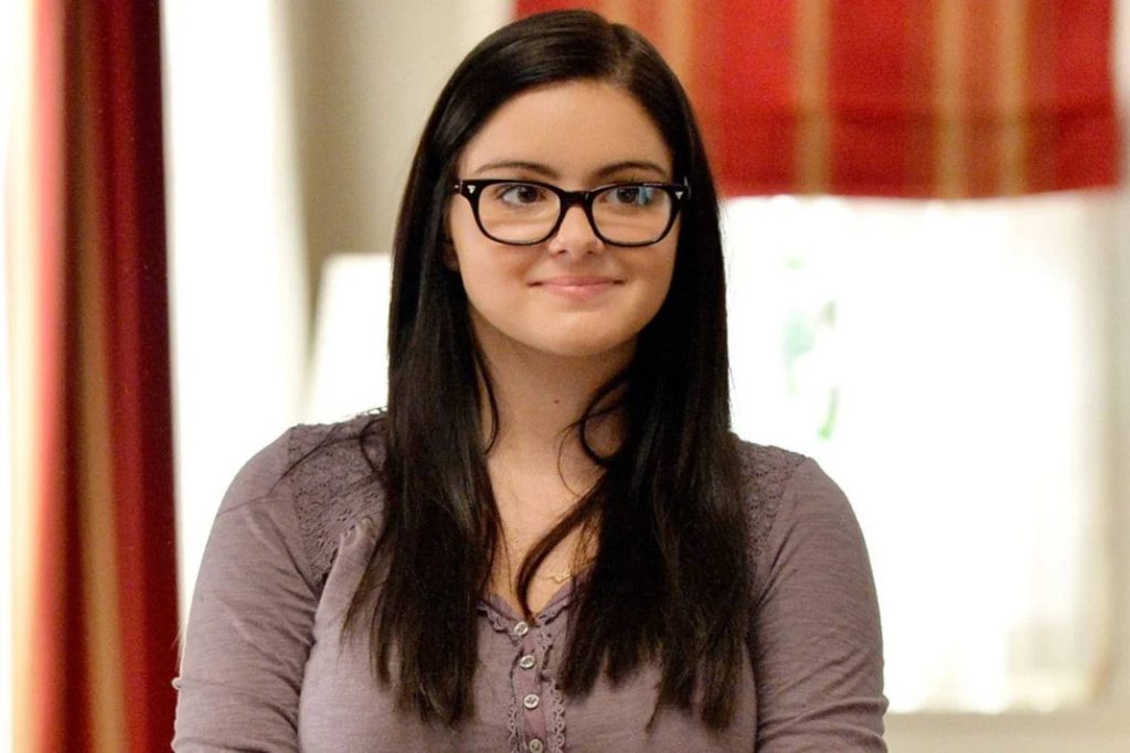 Alex Dunphy from "Modern Family," a visual of Alex smiling at something or someone off string.