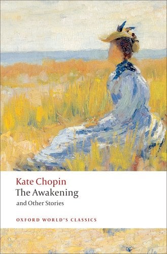 The cover for "The Awakening." A painted lady in a Victorian dress and hat sits in a field staring out at the ocean.