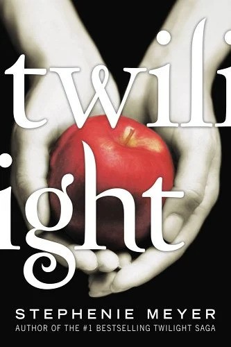 Book cover of Twilight by Stephenie Meyer. A pair of hands holding a bright red apple on a black background.
