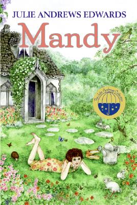 Mandy book cover, girl laying on the lawn outside a cottage looking at nature.