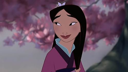 "Mulan" (1998) movie scene of Mulan under a pink flower tree smiling at her father after he places a hair ornament on her head.