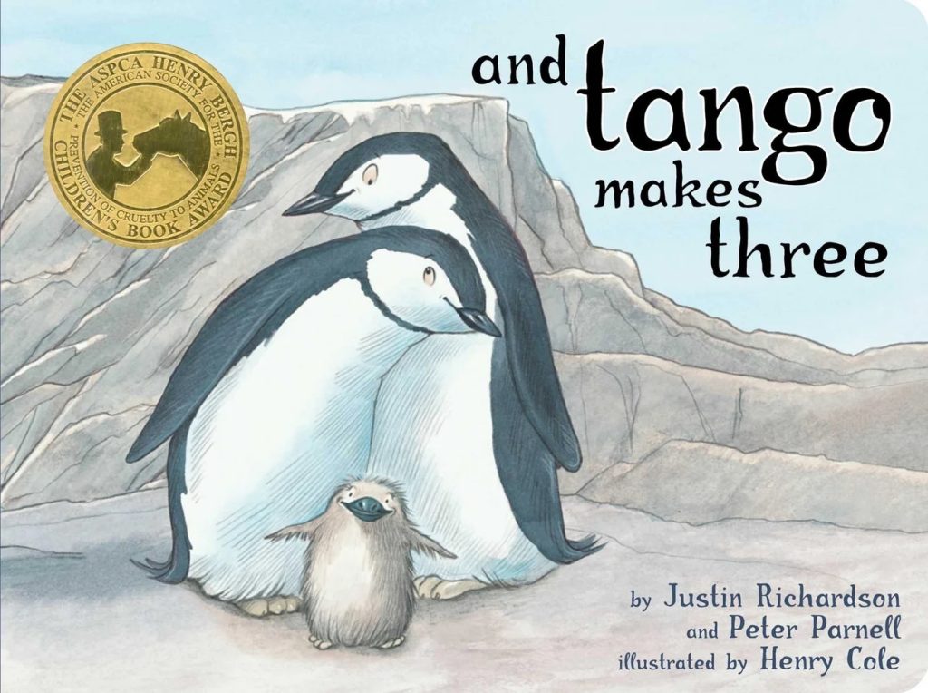 Tango Makes Three cover, three illustrated penguins on the cover including a children's book award seal.