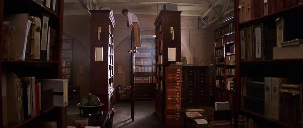 Movie still from The Mummy (by Universal Studios), the scene where she is performing her duties as a librarian. This is the moment before a messy domino affect moment.