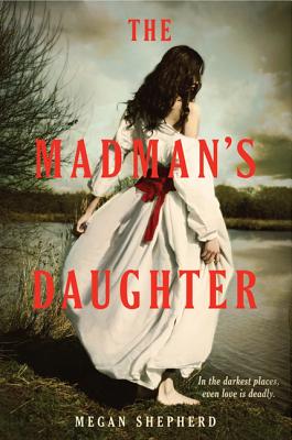 The Madman’s Daughter by Megan Shepherd, book cover depicting a woman in a white dress outside barefoot before a body of water.