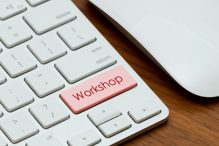 A keyboard with a red highlighted key reads "Workshop."