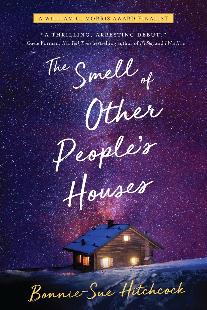 The white cursive text reads "The Smell of Other People's Houses" over the image of a starry purple sky and a lone wooden house with lights on. Above the white text is a yellow bar with black text that reads "A William C. Morris Award Finalist," and below the white text is a similar yellow text that reads "Bonnie-Sue Hitchcock."