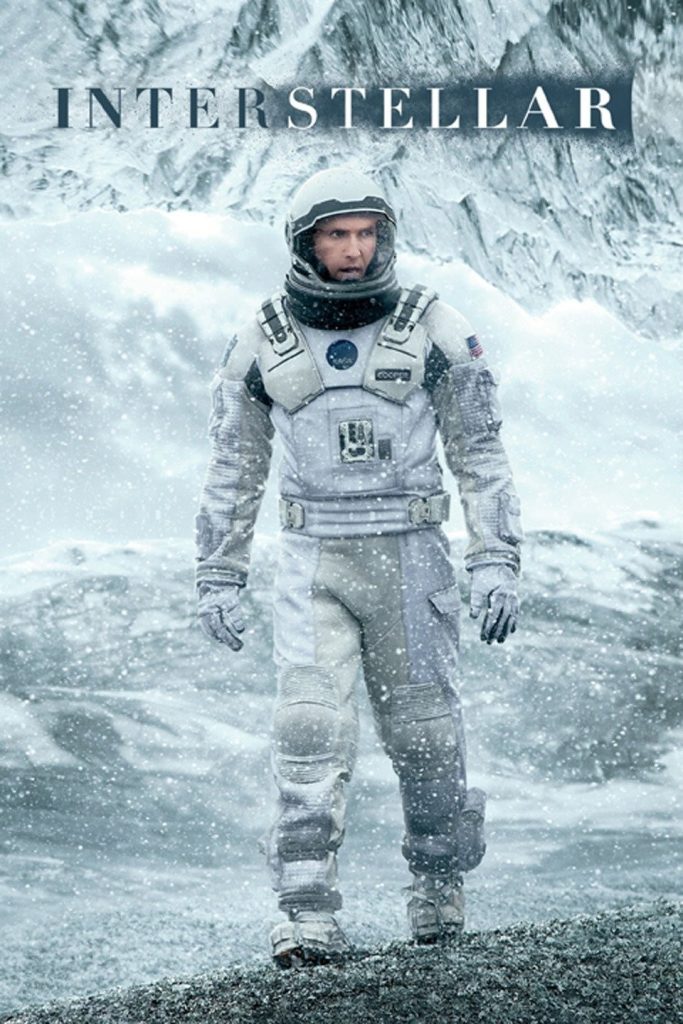 "Interstellar" movie poster of Joseph Cooper in a space suit walking through a snowy landscape.