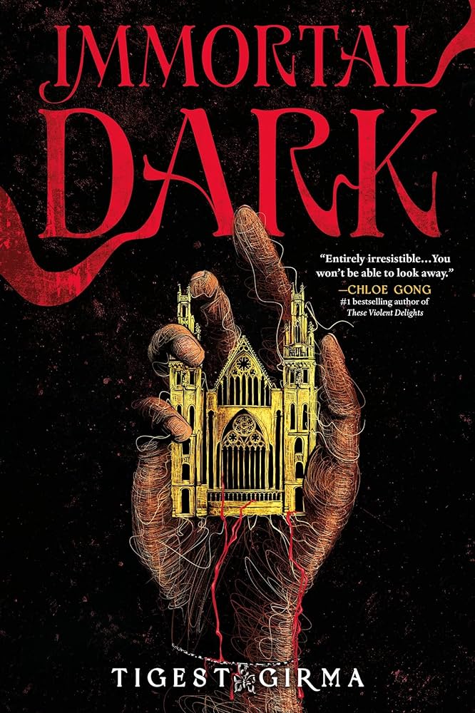 A book cover featuring red text that reads "Immortal Dark". Below it, smaller white text reads "Entirely irresistible... You won't be able to look away". Below the text is a brown hand with trickling blood and white thread that holds a small gothic gold castle and wears a silver charm bracelet. Below the hand, white text reads "Tigest Girma".