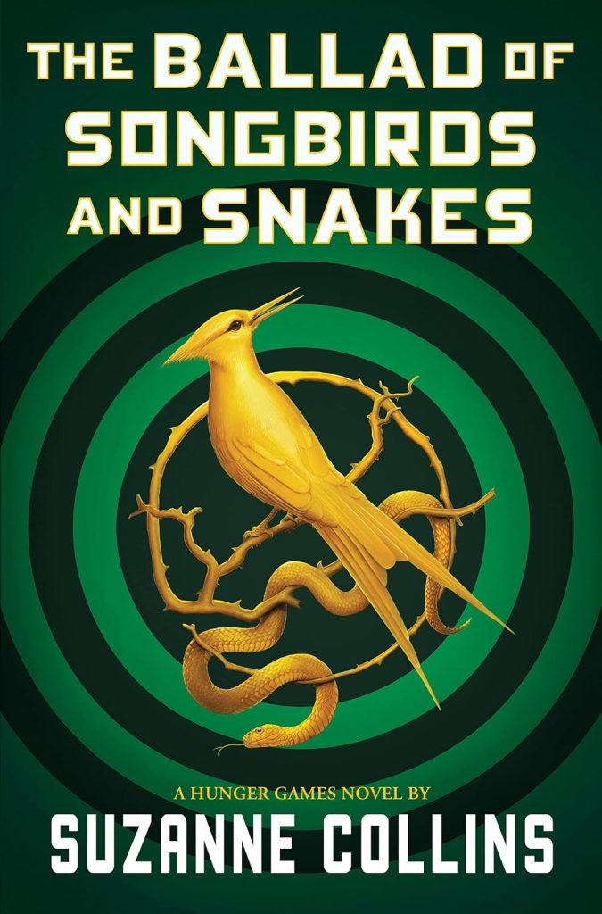 A golden bird and a golden snake are wrapped in thorned branches.