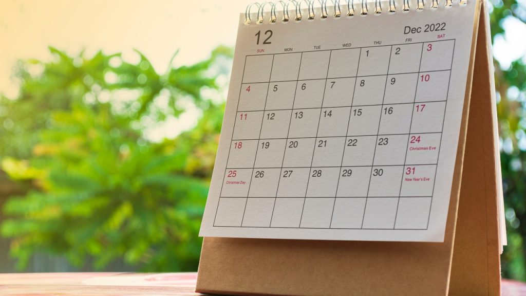 A calendar flipped to December