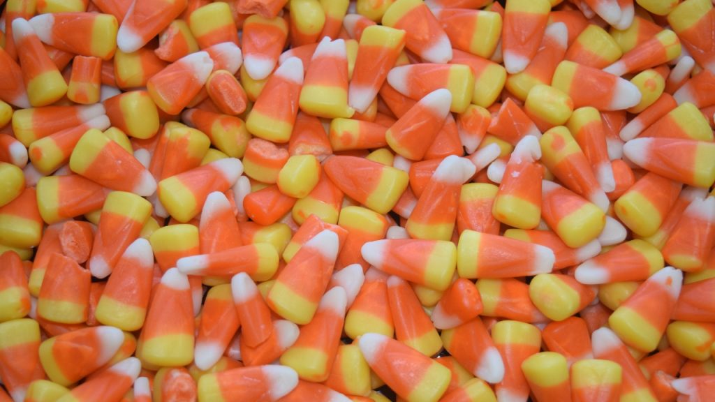 A bunch of candy corn take up the whole picture