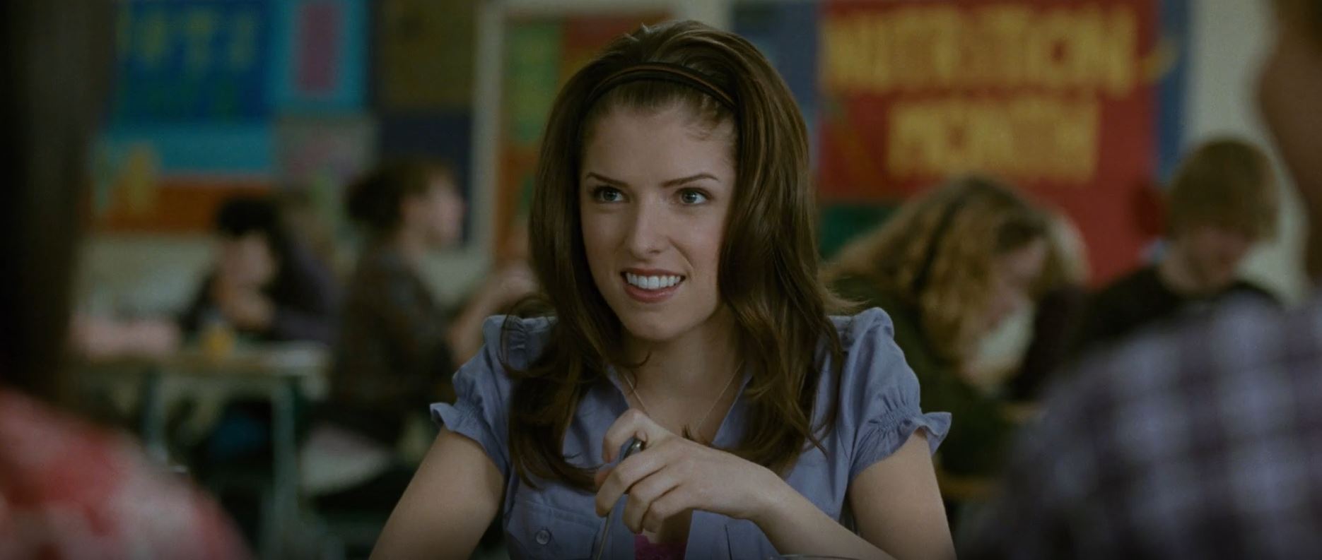 Jessica Stanley eating lunch at the school cafeteria talking with her friends.