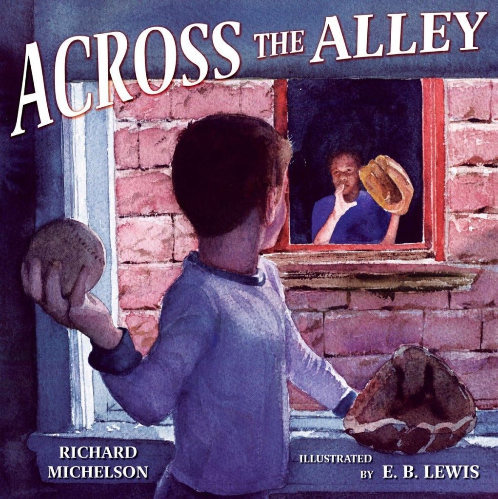 A young boy inside a room holds back a baseball, ready to throw it out the window to another boy for the cover art of Across the Alley.