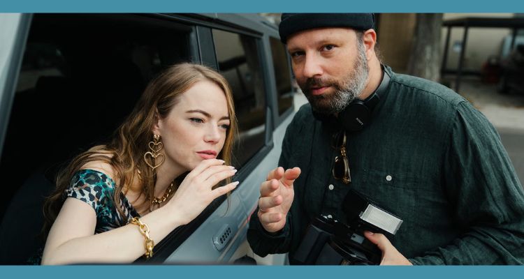 Emma Stone and director Yorgos Lanthimos in discussion on the set of Kinds of Kindness.